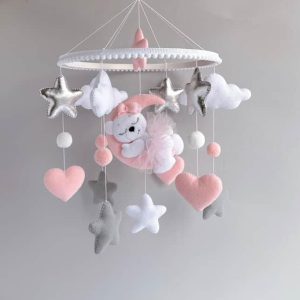 Vrtiljak za posteljico "Medo na lunici", svetlo roza