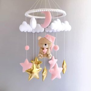 Vrtiljak za posteljico "Medo in zvezdice" roza